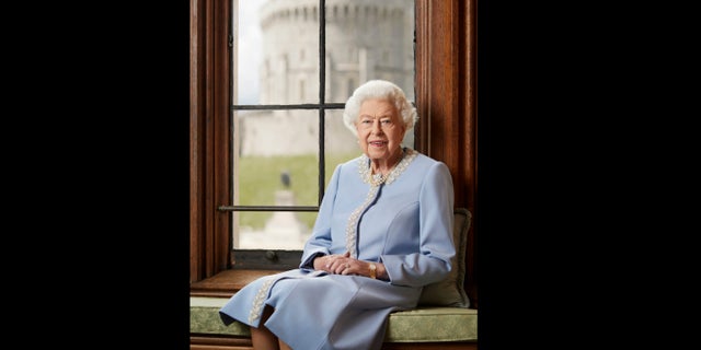 In this photograph, presented by Buckingham Palace on Wednesday, June 1, 2022, is the official jubilee platinum portrait of Queen Elizabeth II of the United Kingdom, recently photographed at Windsor Castle.