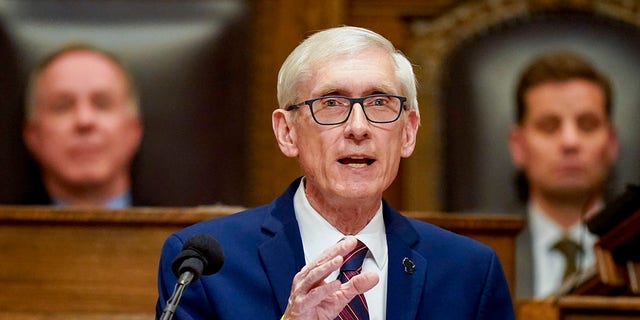Wisconsin Gov. Tony Evers addresses a joint session of the Legislature in the Assembly chambers during the governor's State of the State speech at the state Capitol Tuesday, Feb. 15, 2022, in Madison, Wis. 