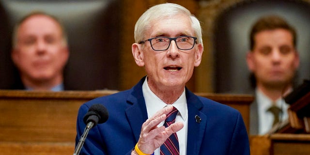 Wisconsin Gov. Tony Evers addresses a joint session of the Legislature in the Assembly chambers during the governor's State of the State speech at the state Capitol Tuesday, Feb. 15, 2022, in Madison, Wis. 