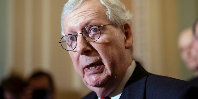 Senate Minority Leader Mitch McConnell, R-Ky., speaks with reporters following a closed-door policy lunch at the Capitol in Washington, Tuesday, May 24, 2022. 