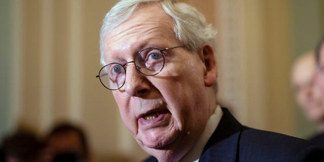 Senate Minority Leader Mitch McConnell, R-Ky., speaks with reporters following a closed-door policy lunch at the Capitol in Washington, Tuesday, May 24, 2022. 