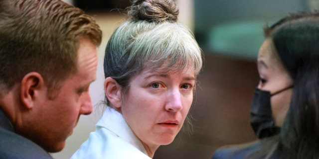 Defendant Danielle Redlick confers with defense counsel during her second-degree murder trial, Thursday, June 9, 2022, at the Orange County Courthouse in Orlando, Fla. 