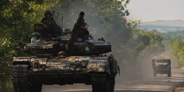 A Ukrainian tank drives in Donetsk region, eastern Ukraine, Thursday, June 9, 2022. (G3 Box News Photo/Bernat Armangue)