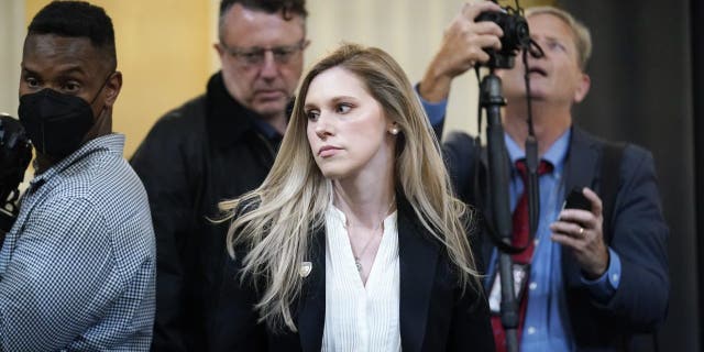 U.S. Capitol Police officer Caroline Edwards arrives as the House select committee investigating the Jan. 6 attack on the U.S. Capitol prepares to hold its first public hearing to reveal the findings of a year-long investigation, at the Capitol in Washington, Thursday, June 9, 2022. 