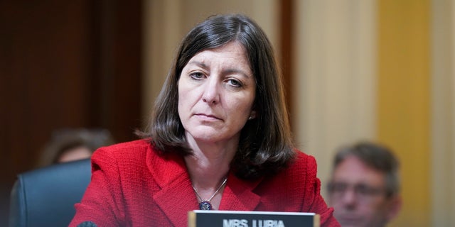 Rep.  Elaine Luria listens as the House select committee investigating the January 6 attack on the Capitol holds its first public hearing on Capitol Hill, June 9, 2022, in Washington.