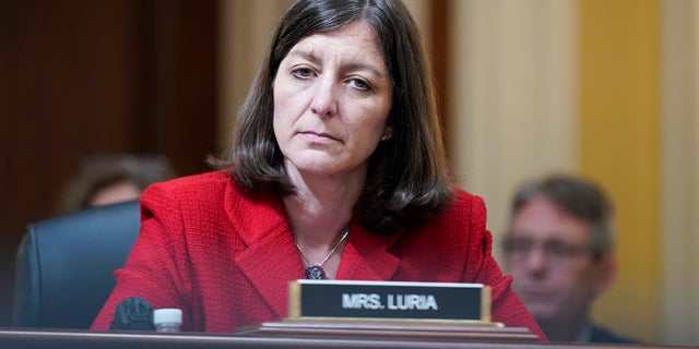 Rep. Elaine Luria listens as the House select committee investigating the Jan. 6 attack on the U.S. Capitol holds its first public hearing on Capitol Hill, June 9, 2022, in Washington.