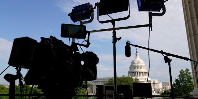 Media set up before the House select committee investigating the Jan. 6 attack on the U.S. Capitol holds its second public hearing to reveal the findings of a year-long investigation, on Capitol Hill, Monday, June 13, 2022, in Washington. (AP Photo/Andrew Harnik)