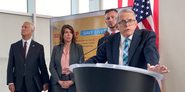 Gov. Mike DeWine discusses a law that gives school districts the option of arming trained school employees, on June 13, 2022, in Columbus, Ohio.