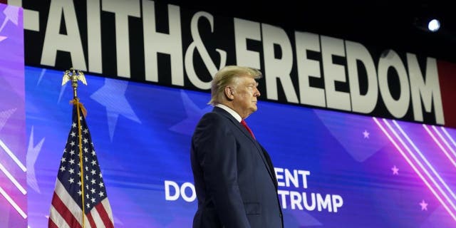 Former President Donald Trump walks on to the stage to speak at the Road to Majority conference Friday, June 17, 2022, in Nashville, Tenn.