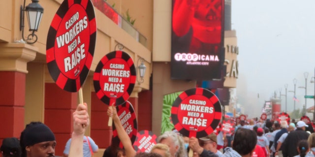 Union members picket outside the Tropicana casino in Atlantic City, NJ.