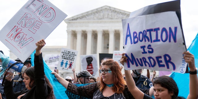 Anti-abortion protesters gather outside the Supreme Court in Washington, Friday, June 24, 2022. The Supreme Court ended constitutional abortion protections that had been in place for nearly 50 years, a decision by its conservative majority of quash landmark abortion cases from court. 