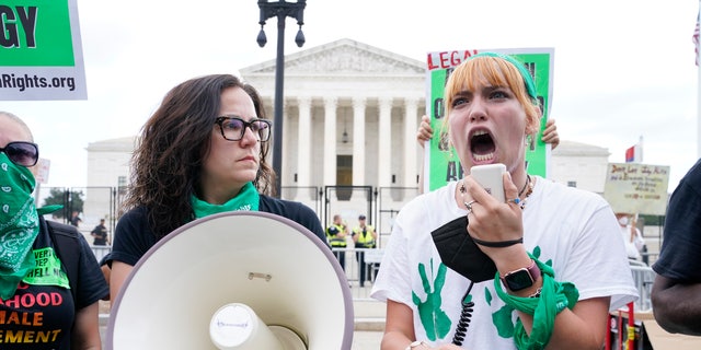Angry woman yelling after the Supreme Court overturns Roe v. Wade in Washington, Friday, June 24, 2022.