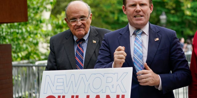 Andrew Giuliani, right, a Republican candidate for Governor of New York, is joined by his father, former New York City mayor Rudy Giuliani, during a news conference, June 7, 2022, in New York  City (AP Photo/Mary Altaffer, File)