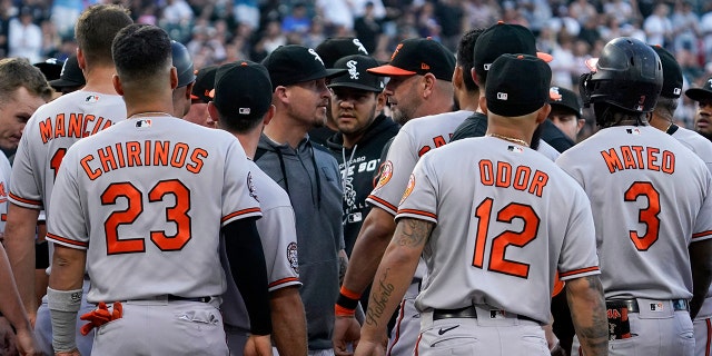 Players from the Baltimore Orioles and Chicago White Sox exchange words after Jorge Mateo of the Baltimore Orioles was hit by a pitch from Chicago White Sox starter Michael Kopech during the second inning in Chicago Friday, June 24, 2022. 