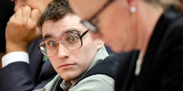 Marjory Stoneman Douglas High School shooter Nikolas Cruz is shown at the defense table during jury selection in the penalty phase of his trial at the Broward County Courthouse in Fort Lauderdale on Tuesday, June 28, 2022. (Amy Beth Bennett/South Florida Sun Sentinel via G3 Box News, Pool)