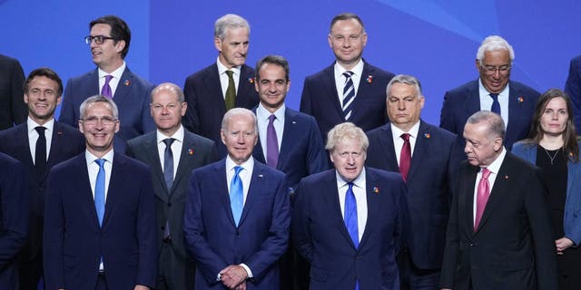 NATO Secretary General Jens Stoltenberg, U.S. President Joe Biden, British Prime Minister Boris Johnson and Turkish President Recep Tayyip Erdogan, front row from left, pose with other leaders for a group photo during the NATO summit in Madrid, Spain, on Wednesday, June 29, 2022. 