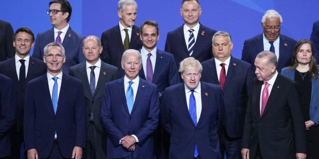 NATO Secretary General Jens Stoltenberg, U.S. President Joe Biden, British Prime Minister Boris Johnson and Turkish President Recep Tayyip Erdogan, front row from left, pose with other leaders for a group photo during the NATO summit in Madrid, Spain, on Wednesday, June 29, 2022. 