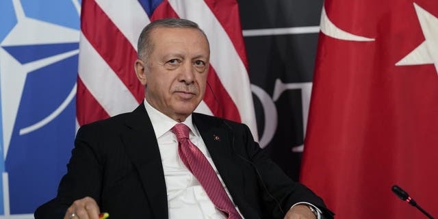 Turkey's President Recep Tayyip Erdogan listens while meeting with President Joe Biden during the NATO summit in Madrid, Wednesday, June 29, 2022. 