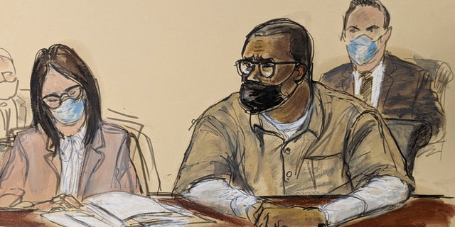 R. Kelly and his attorney Jennifer Bonjean, left, appear during his sentencing hearing. Kelly was sentenced to 30 years in prison for his sex trafficking conviction.
