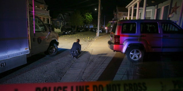 Providence Police investigate a shooting on Carolina Avenue which left 9 injured and 3 behind bars.