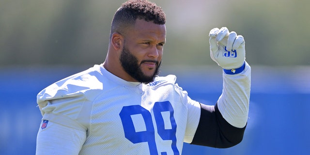 Aaron Donald #99 of the Los Angeles Rams looks on during mini camp on June 8, 2022 at the team's facility at California Lutheran University in Thousand Oaks, California.