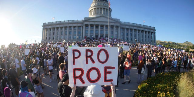 People attend an abortion-rights protest at the Utah State Capitol in Salt Lake City after the Supreme Court's Dobbs decision.