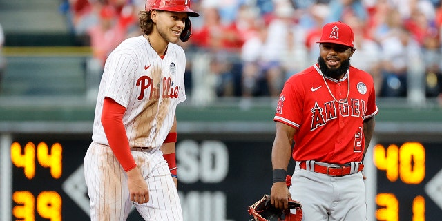 Alec Bohm of the Philadelphia Phillies, left, and Luis Rengifo of the Los Angeles Angels speak during the second inning at Citizens Bank Park June 3, 2022, in Philadelphia.
