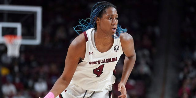 South Carolina forward Aliyah Boston dribbles during the first half of an NCAA college basketball game against Auburn, Feb. 17, 2022, in Columbia, S.C. Boston was named the Collegiate Woman Athlete of the Year on Monday, June 27, 2022. 