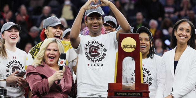 Aliyah Boston #4 of the South Carolina Gamecocks reacts during the national championship trophy presentation after defeating the UConn Huskies 64-49 during the 2022 NCAA Women's Basketball Tournament National Championship game at Target Center on April 03, 2022 in Minneapolis, Minnesota. 