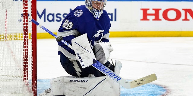 Tampa Bay Lightning goaltender Andrei Vasilevskiy (88) makes a save as he blocks a shot against the New York Rangers during the third period in Game 4 of the NHL Hockey Stanley Cup playoffs Eastern Conference finals Tuesday, June 7, 2022, in Tampa, Fla.