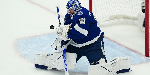 Tampa Bay Lightning goaltender Andrei Vasilevskiy blocks a shot during the first period of Game 4 of the NHL hockey Stanley Cup Finals against the Colorado Avalanche on Wednesday, June 22, 2022, in Tampa, Fla. 