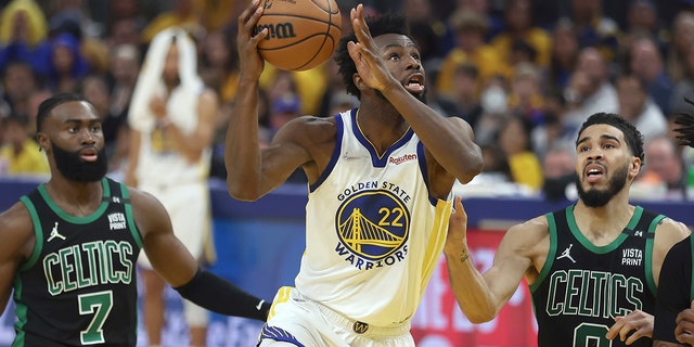 Golden State Warriors forward Andrew Wiggins shoots against the Boston Celtics during the NBA Finals in San Francisco, Monday, June 13, 2022.