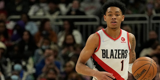 Anfernee Simons of the Portland Trail Blazers dribbles the ball against the Milwaukee Bucks during the second half at Fiserv Forum Feb. 14, 2022, in Milwaukee.