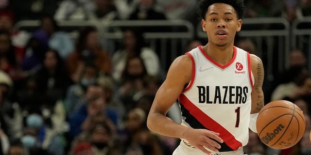 Anfernee Simons of the Portland Trail Blazers dribbles the ball against the Milwaukee Bucks during the second half at Fiserv Forum Feb. 14, 2022, in Milwaukee.