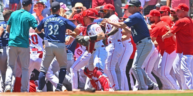 Jun 26, 2022; Anaheim, California, USA;  The Los Angeles Angels and Seattle Mariners cleared the benched during a brawl in the second inning at Angel Stadium.