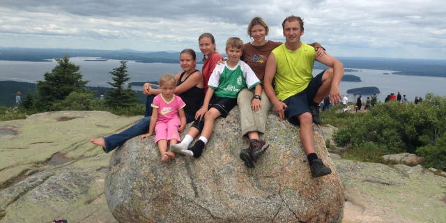 Anastasia and Alina Antropova visited Acadia National Park in Maine in 2017 with their family. They're pictured here in a family portrait with siblings Agatha and Borese, plus their parents Anna and Andrey — who immigrated to the U.S. in 2001 as a young couple from Russia.