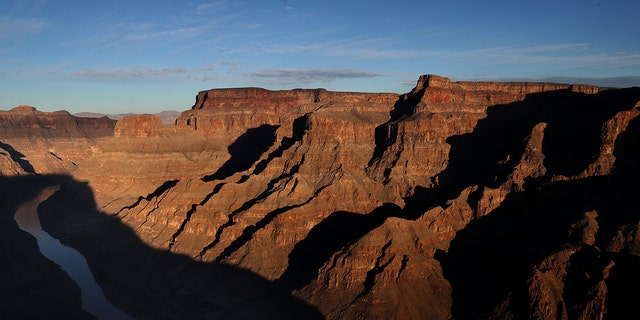 The Colorado River winds its way along the West Rim of the Grand Canyon in the Hualapai Indian Reservation on January 10, 2019 near Peach Springs, Arizona. 