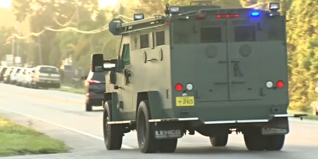 A Hillsborough County armored vehicle arrives at a standoff/hostage situation on Wednesday.