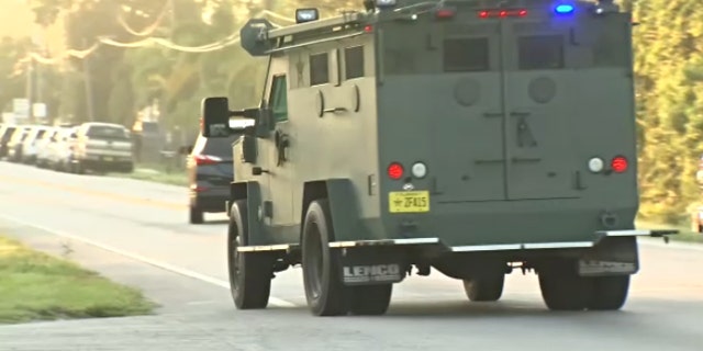 A Hillsborough County armored vehicle arrives at a standoff/hostage situation on Wednesday.