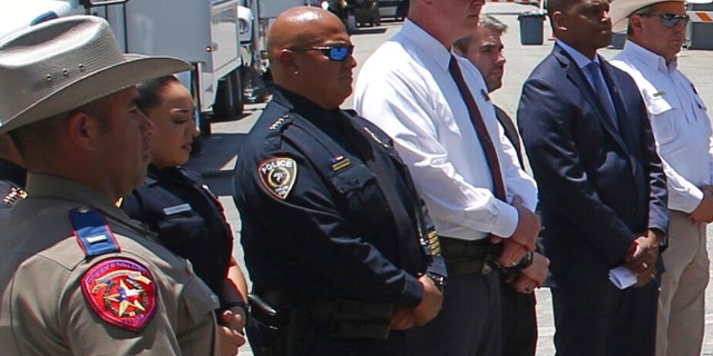 Uvalde School Police Chief Pete Arredondo, third from left.