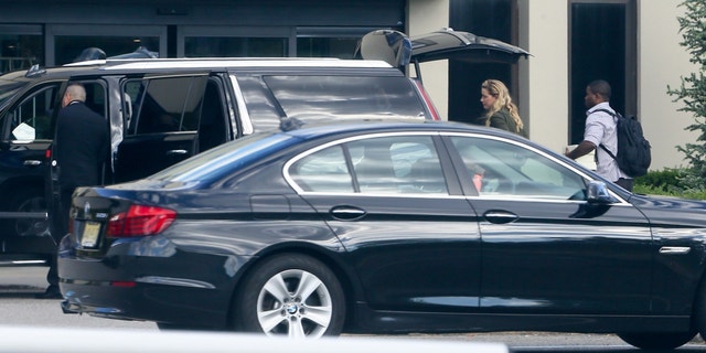Amber Heard arrived at the private airport on Friday accompanied by a driver.