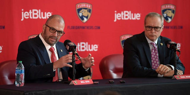Bill Zito, left, general manager of the Florida Panthers, and Paul Maurice, new head coach of the Panthers, take questions during an NHL hockey news conference at FLA Live Arena, Friday, June 23, 2022, in Sunrise, Fla. 