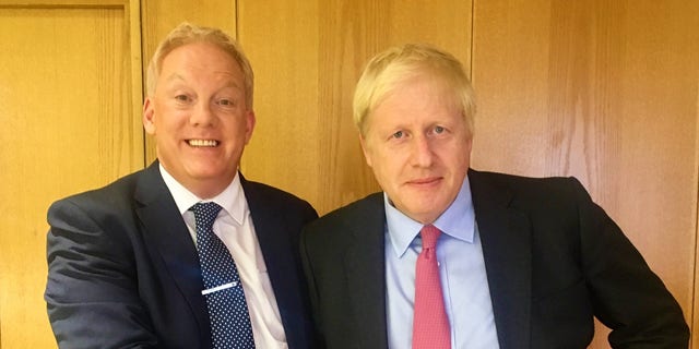 Royal expert Neil Sean and Prime Minister Boris Johnson. 