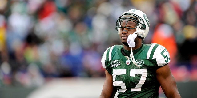 Bart Scott #57 of the New York Jets looks on against the Buffalo Bills at Giants Stadium on October 18, 2009 in East Rutherford, New Jersey. The Bills defeated the Jets 16-13 in overtime.