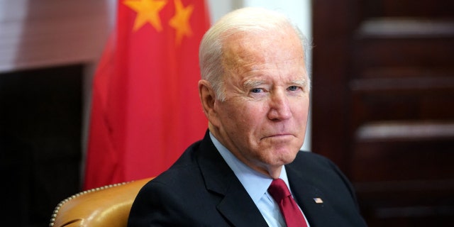 Joe Biden meets with Chinese President Xi Jinping during a virtual summit from the Roosevelt Room.