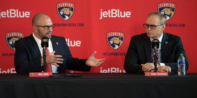 Paul Maurice, right, new head coach of the Florida Panthers, and general manager Bill Zito take questions during an NHL hockey news conference at FLA Live Arena, Friday, June 23, 2022, in Sunrise, Fla. 