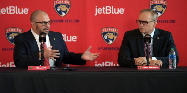 Paul Maurice, right, new head coach of the Florida Panthers, and general manager Bill Zito take questions during an NHL hockey news conference at FLA Live Arena, Friday, June 23, 2022, in Sunrise, Fla. 