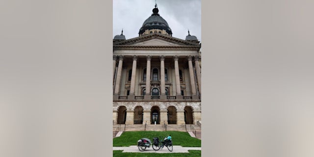 After visiting the Illinois State Capitol, Barnes visited a blood donation center run by ImpactLife — he's made a point of trying to give back to others during his trip. His bicycle is pictured in front of the building. 
