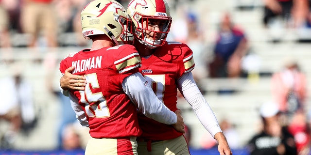 Colby Wadman (15) of the Birmingham Stallions congratulates teammate Brandon Aubrey (10) after he kicked the game-winning field goal in the fourth quarter against the New Orleans Breakers at Legion Field June 4, 2022, in Birmingham, Ala.