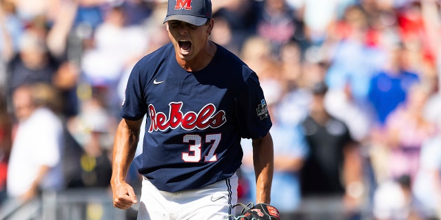 Mississippi pitcher Brandon Johnson (37) reacts after striking out the penultimate Oklahoma batter in the ninth inning in Game 2 of the NCAA College World Series baseball finals, Sunday, June 26, 2022, in Omaha, Neb.